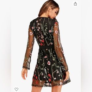 Beautiful and flattering sheer sleeve dress